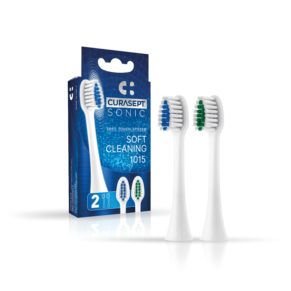 two spare soft cleaning heads and pack for Curasept Sonic soft touch system toothbrush
